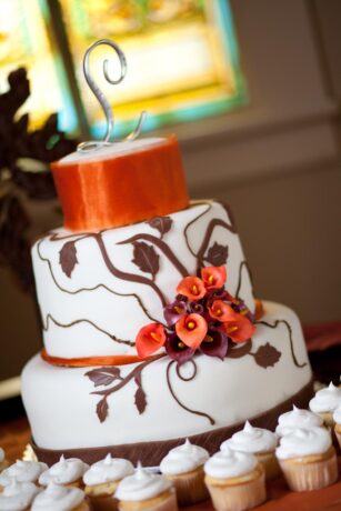 orange decorated wedding cake