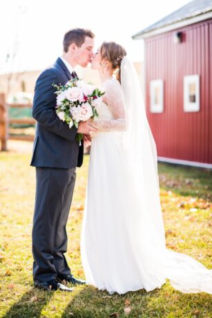 full shot of couple kissing