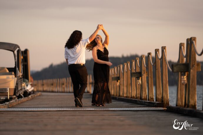 bride and groom dancing on the boardwalk
