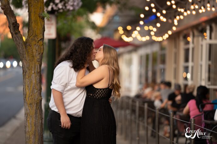 bride and groom kissing downtown Coeur D Alene