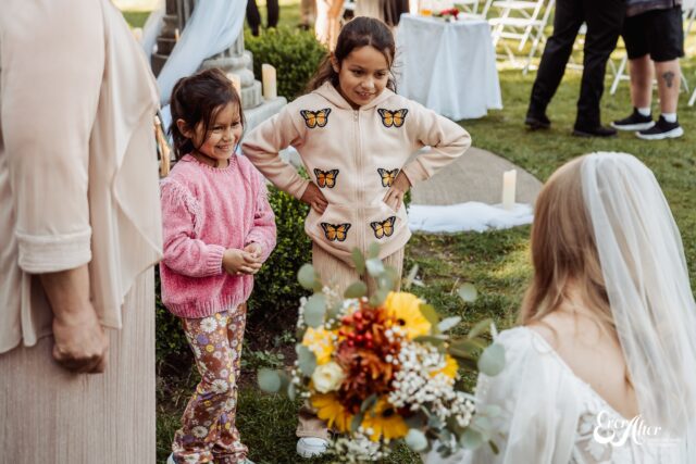 Bride greeting kids