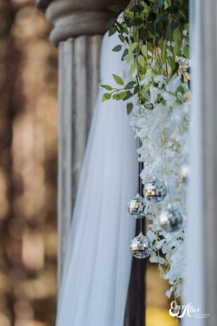 White flowers, disco balls and décor